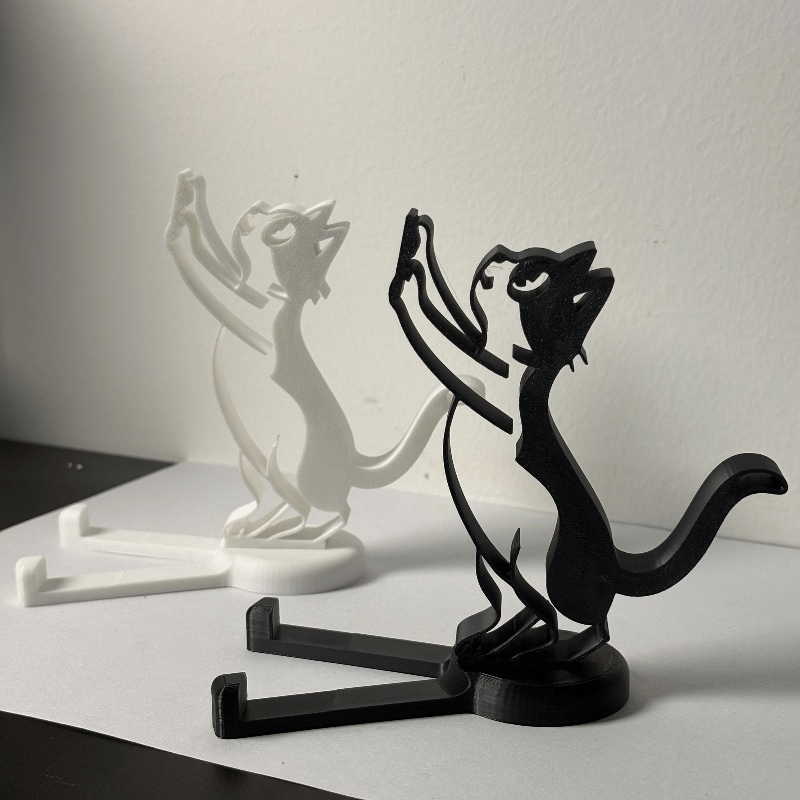 Desk Phone Stand - 抽象的な中空ラインの猫型スマホスタンド、ミニマリストなキティ型デスクタブレットホルダー、かわいい動物彫刻携帯電話スタンド