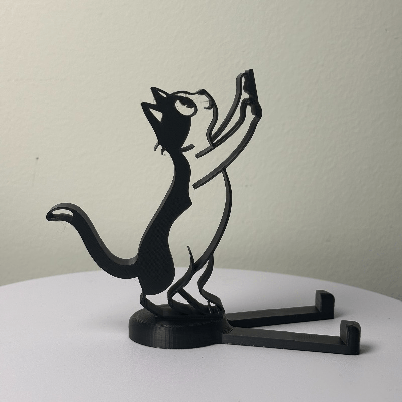 抽象的な中空ラインの猫型スマホスタンド、ミニマリストなキティ - Desk Phone Stand のレビューと価格