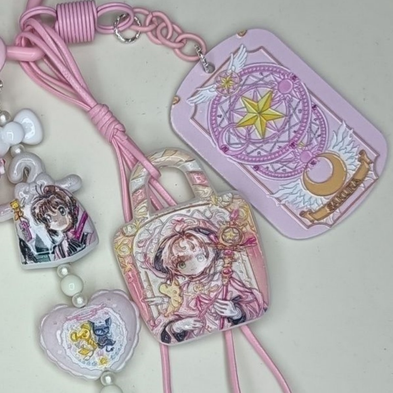 新モデルカードキャプターさくらガーリッシュハート創造性スター - Phone Accessories Hanging のレビューと価格