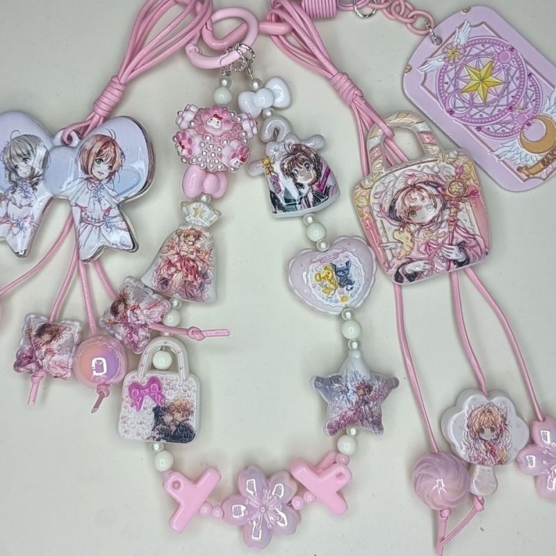 新モデルカードキャプターさくらガーリッシュハート創造性スター - Phone Accessories Hanging のレビューと価格